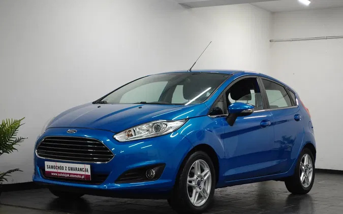 samochody osobowe Ford Fiesta cena 26900 przebieg: 166556, rok produkcji 2013 z Wołów